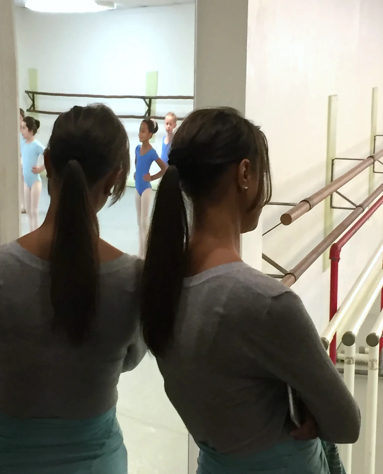 Carmen watching Grace during her first ballet class