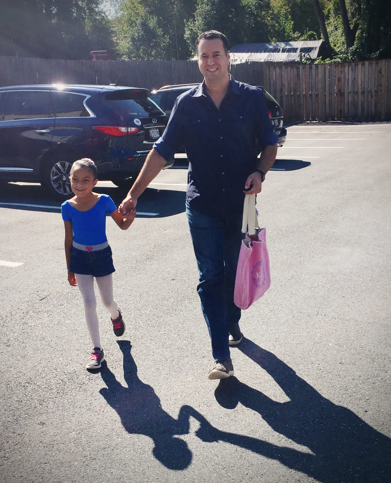 Grace walking into her first ballet class with her father